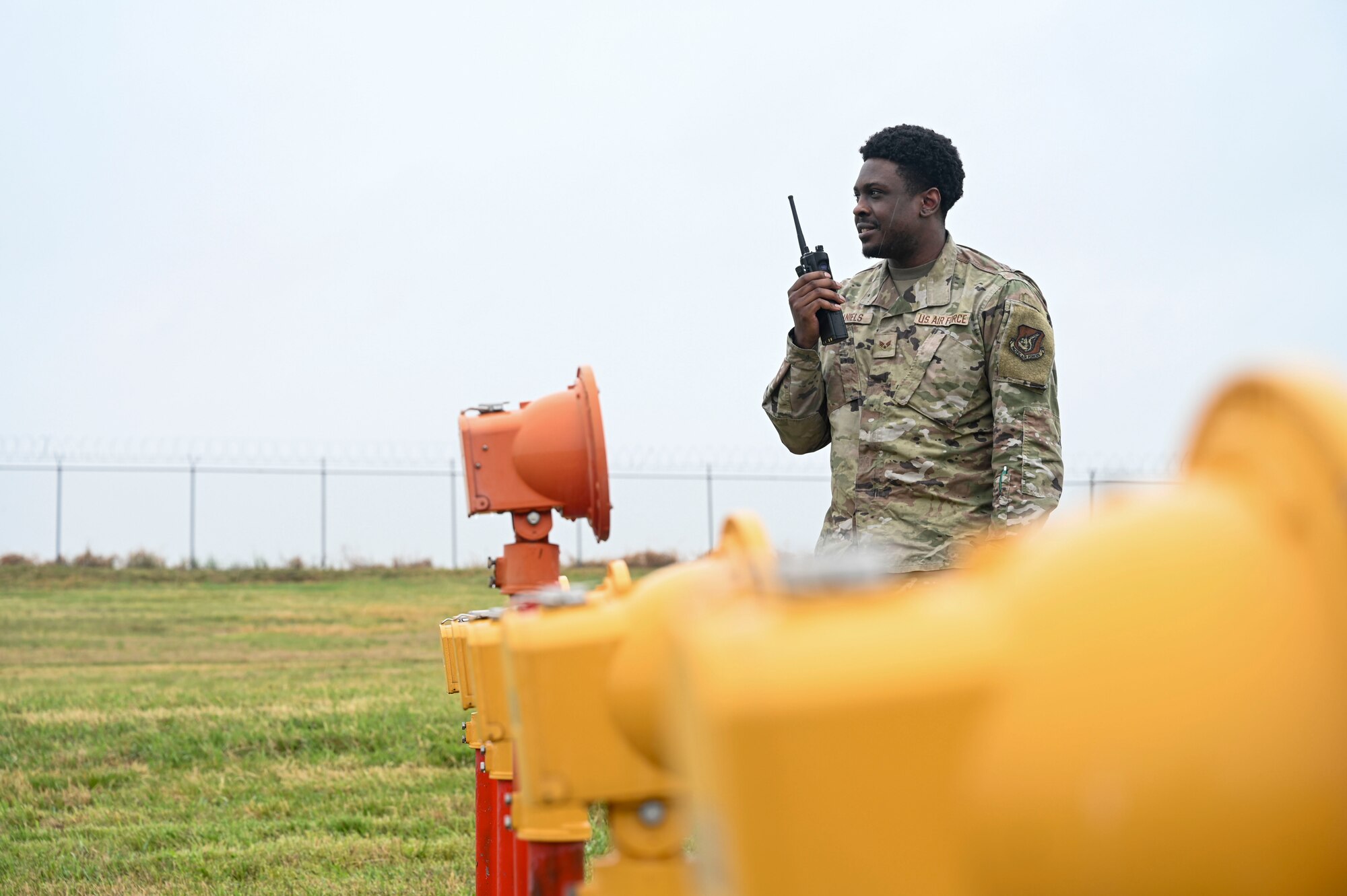Senior Airman Morisse Daniels, 8th Operations Support Squadron airfield management operations supervisor, relays approach lighting operability during Freedom Flag 25-1 at Kunsan Air Base, Republic of Korea, April 22, 2025.