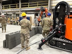 The 175th CES at Martin State Air National Guard Base, Maryland, is at the forefront of innovation in developing an Expeditionary 3D Concrete Printer to rapidly build fortified infrastructure that supports warfighters and sustains operations in contested environments. (Courtesy of 175th CES/Maj. Brian Vickers)