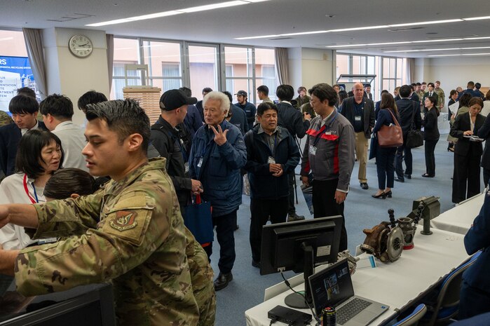 U.S. Air Force Airmen and Japanese business representatives interact during Industry Day at Misawa International Center, April 18, 2025. The event drew dozens of local and regional companies to engage with the 35th Fighter Wing, fostering collaboration, innovation and economic growth through U.S. government contracting opportunities. (U.S. Air Force photo by Senior Airman William Rodriguez)