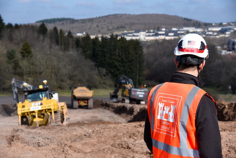 Man watching bulldozer