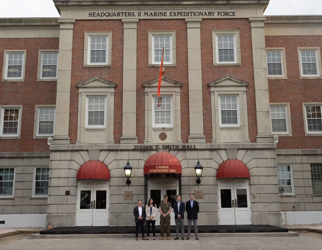 U.S. Marine Corps Brig. Gen. Samuel L. Meyer, center, the deputy commanding general of II Marine Expeditionary Force, poses for a photo with U.S. Marine Corps Master Gunnery Sgt. Calvin B. Ruidiaz, left, the Senate Liaison, Abigail Zarzar, the Military Legislative Assistant of Sen. Ted Budd, Graham Gunter, the Military Legislative Correspondent of Sen. Ted Budd, and U.S. Air Force Maj. Andrew Gutowski, the Legislative Fellow in the Office of the Secretary of the Air Force Legislative Liaisons, during a Congressional Staff Delegation visit on Marine Corps Base Camp Lejeune, North Carolina, April 23, 2025. During the visit, Marines and Sailors discussed II MEF’s expeditionary capabilities as the nation’s crisis response force. (U.S. Marine Corps photo by Lance Cpl. Caroline Perkins)