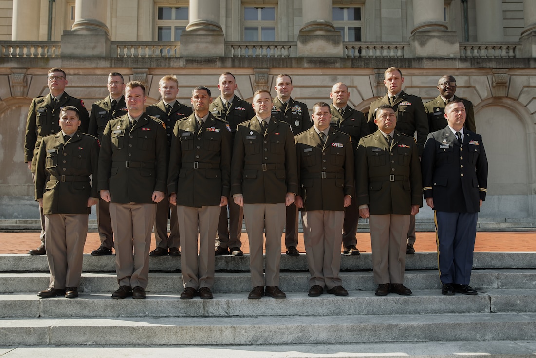 Graduates from OCS Class 67-25 of the Kentucky Army National Guard pose for a group photo at the Kentucky State Capitol in Frankfort, Kentucky, April 12, 2025.