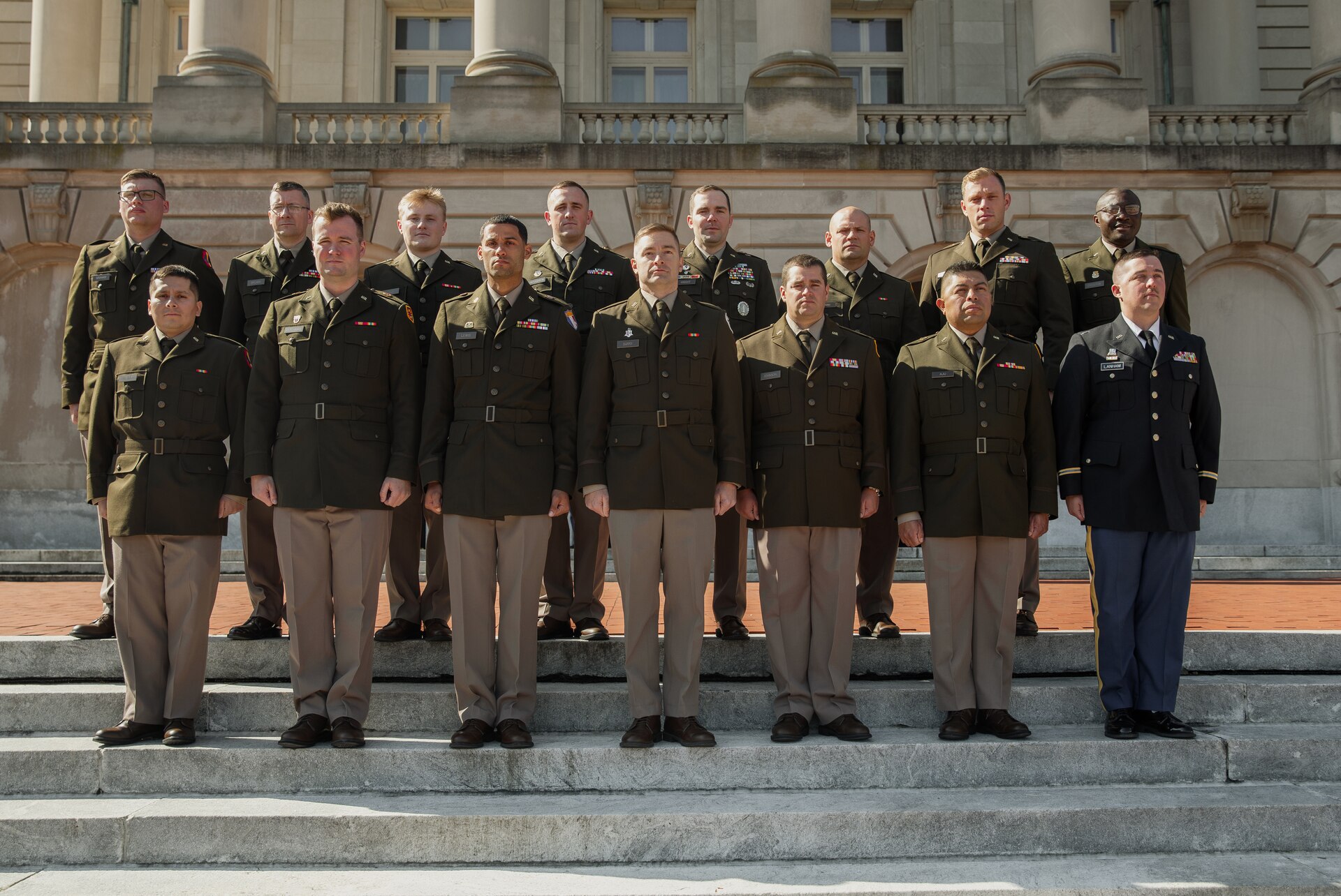 Graduates from OCS Class 67-25 of the Kentucky Army National Guard pose for a group photo at the Kentucky State Capitol in Frankfort, Kentucky, April 12, 2025.