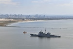 Ticonderoga-class guided missile cruiser USS Cape St. George (CG 71) arrives at the mouth of San Diego Bay, April 22, 2025.