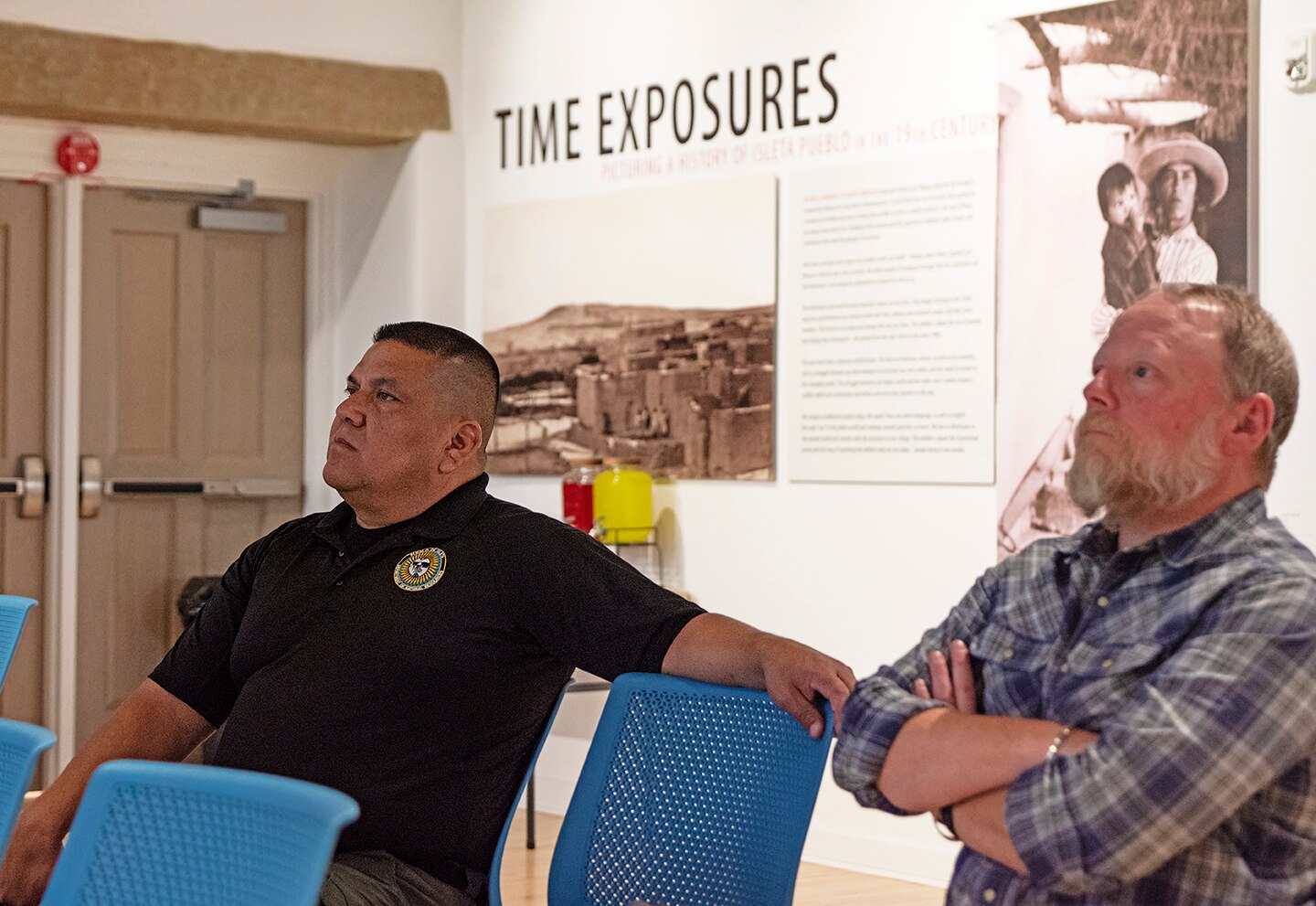 Clint Lente, left, director, Pueblo of Isleta Department of Natural Resources, and Andrew Sweetman, right, division manager, Water Resources Division, listen during the kick-off meeting for the cultural preservation study of the pueblo’s historic Pottery Mound site, April 7, 2025.