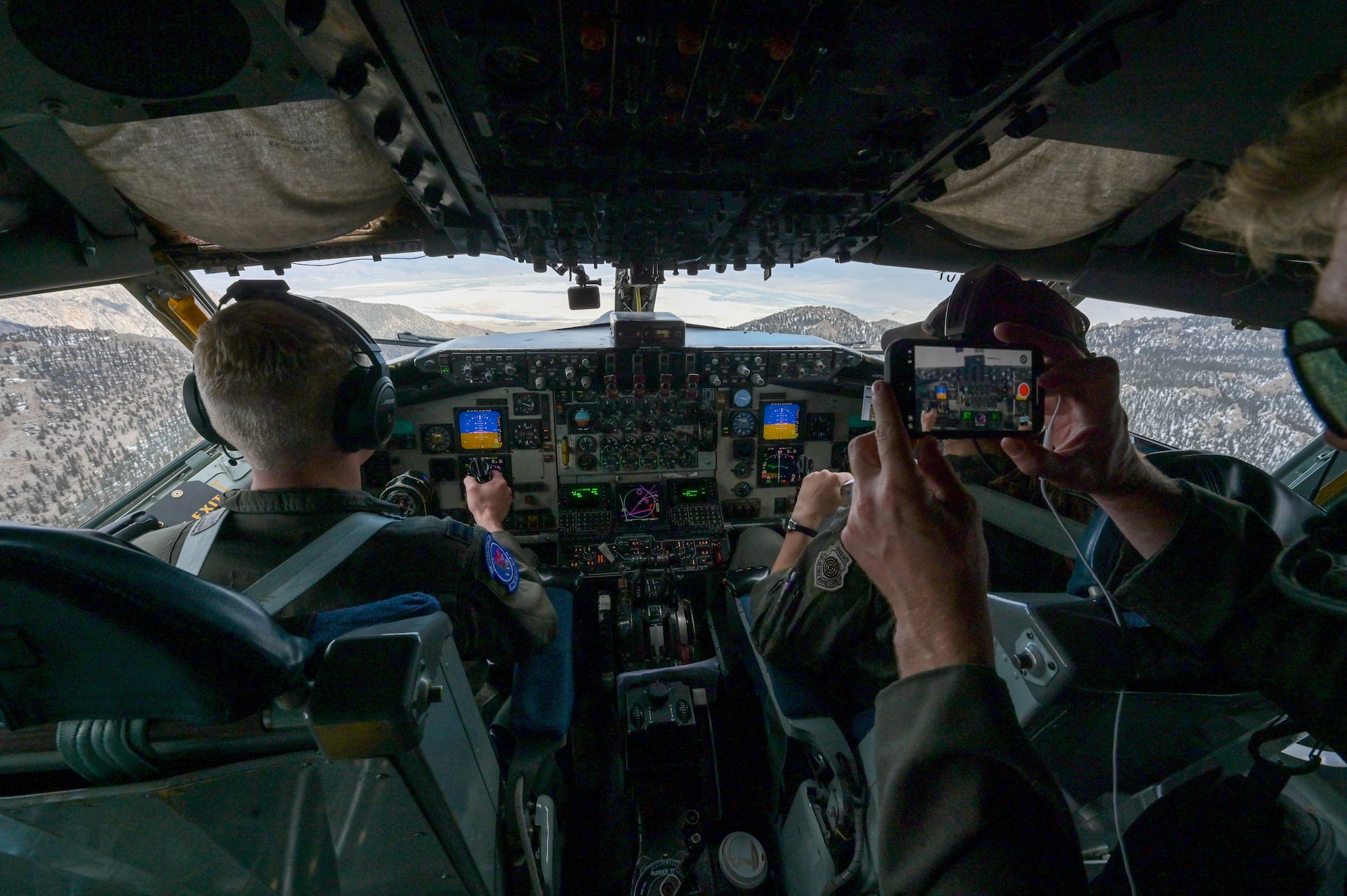 350th Air Refueling Squadron KC-135 Statotanker pilots navigate through mountainous terrain April 17, 2025, over eastern California. Low-level flights that require precision can help pilots build confidence in their abilities. (U.S. Air Force photo by Airman 1st Class Paula Arce)