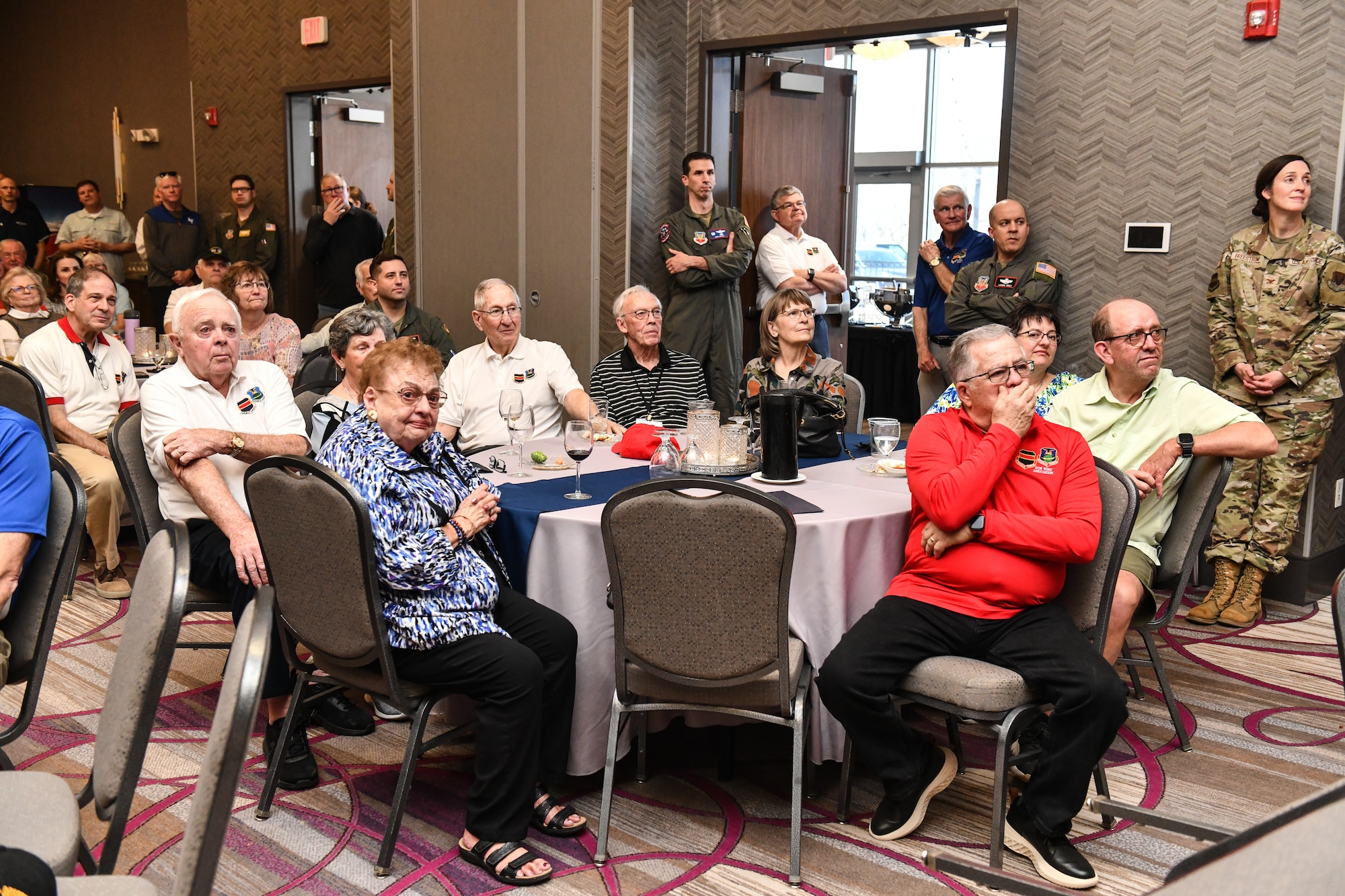 Members of the 55th Wing Association listen to stories and presentations at the annual Tales of the 55th event at the Beardmore Event Center in Bellevue, Nebraska on March 27. The annual event was established in 1999 by retired Lt. Col. Robb Hoover as a way for wing veterans to share their personal experiences with former and current members. (U.S. Air Force photo by Chad Watkins)