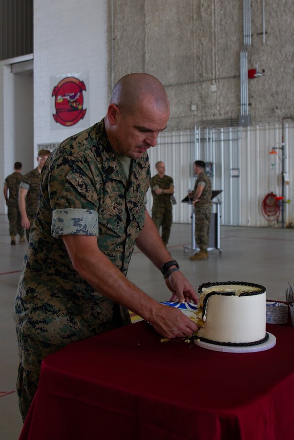 U.S. Marine Corps Sgt. Maj. Carl Woods, the senior-enlisted leader with Marine Transport Squadron 1 (VMR-1), cuts the birthday cake during the 73rd Birthday Celebration for VMR-1 on Naval Air Station (NAS) Joint Reserve Base (JRB) Fort Worth, Fort Worth, Texas, Oct. 04, 2024. The celebration was held to recognize the impact VMR-1 has had on the Fleet Marine Corps, Marine Corps Installation Command and the Marine Corps over the past 73 years. (U.S. Marine Corps photo by Sgt. Kree Laing)
