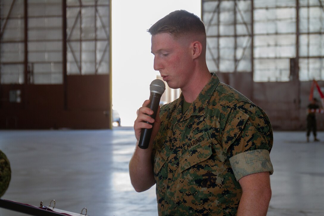 U.S. Marine Corps Cpl. Ethan Jolly, a C-130 loadmaster with Marine Transport Squadron 1 (VMR-1), narrates during the 73rd Birthday Celebration of VMR-1 on Naval Air Station (NAS) Joint Reserve Base (JRB) Fort Worth, Fort Worth, Texas, Oct. 04, 2024. The celebration was held to recognize the impact VMR-1 has had on the Fleet Marine Corps, Marine Corps Installation Command and the Marine Corps over the past 73 years. (U.S. Marine Corps photo by Sgt. Kree Laing)
