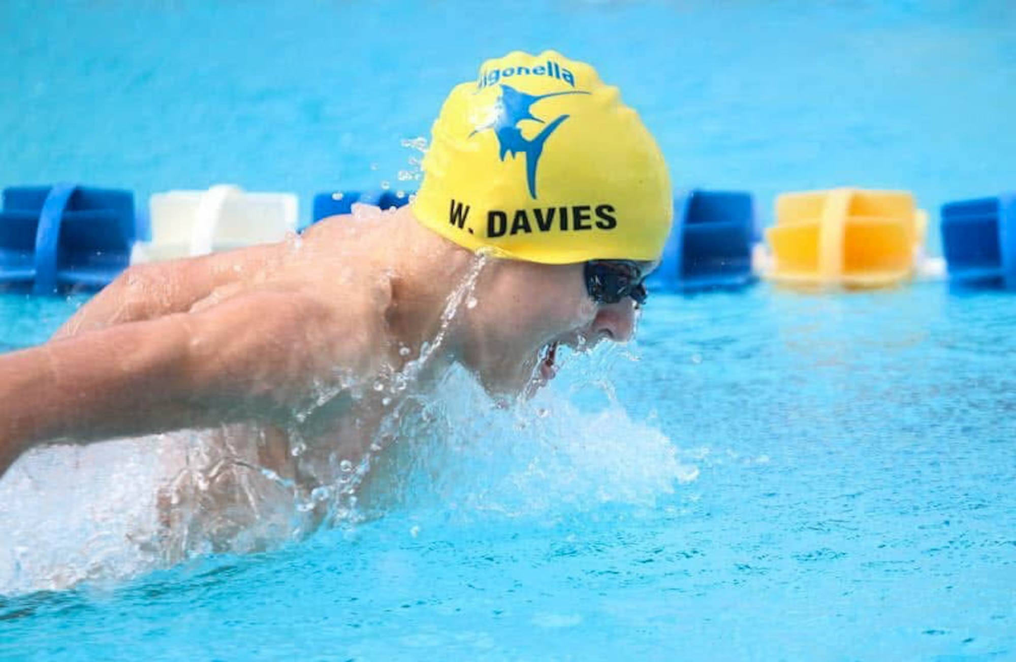Photo of Airman 1st Class Wesley Davies swimming in a competition at Naval Air Station (NAS), Sigonella. (Courtesy photo)