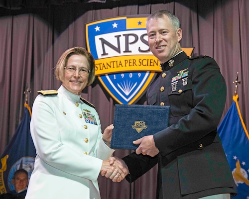 Then-Maj. Thomas Cecil graduates from Naval Postgraduate School, June 21, 2024.