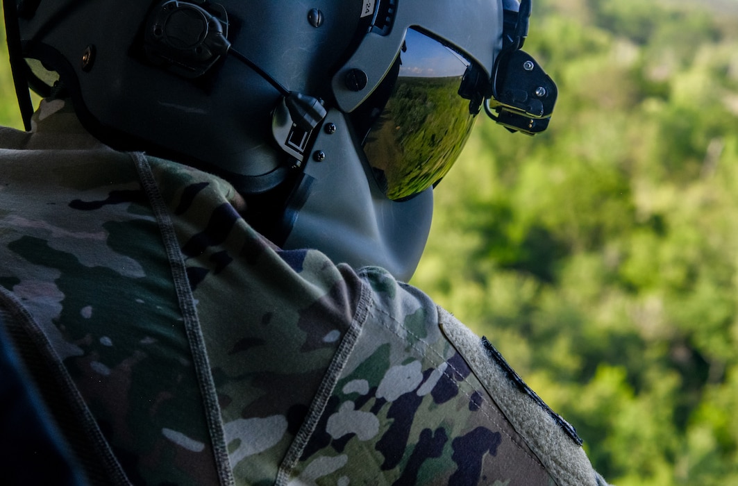 a person look out of a helicopter