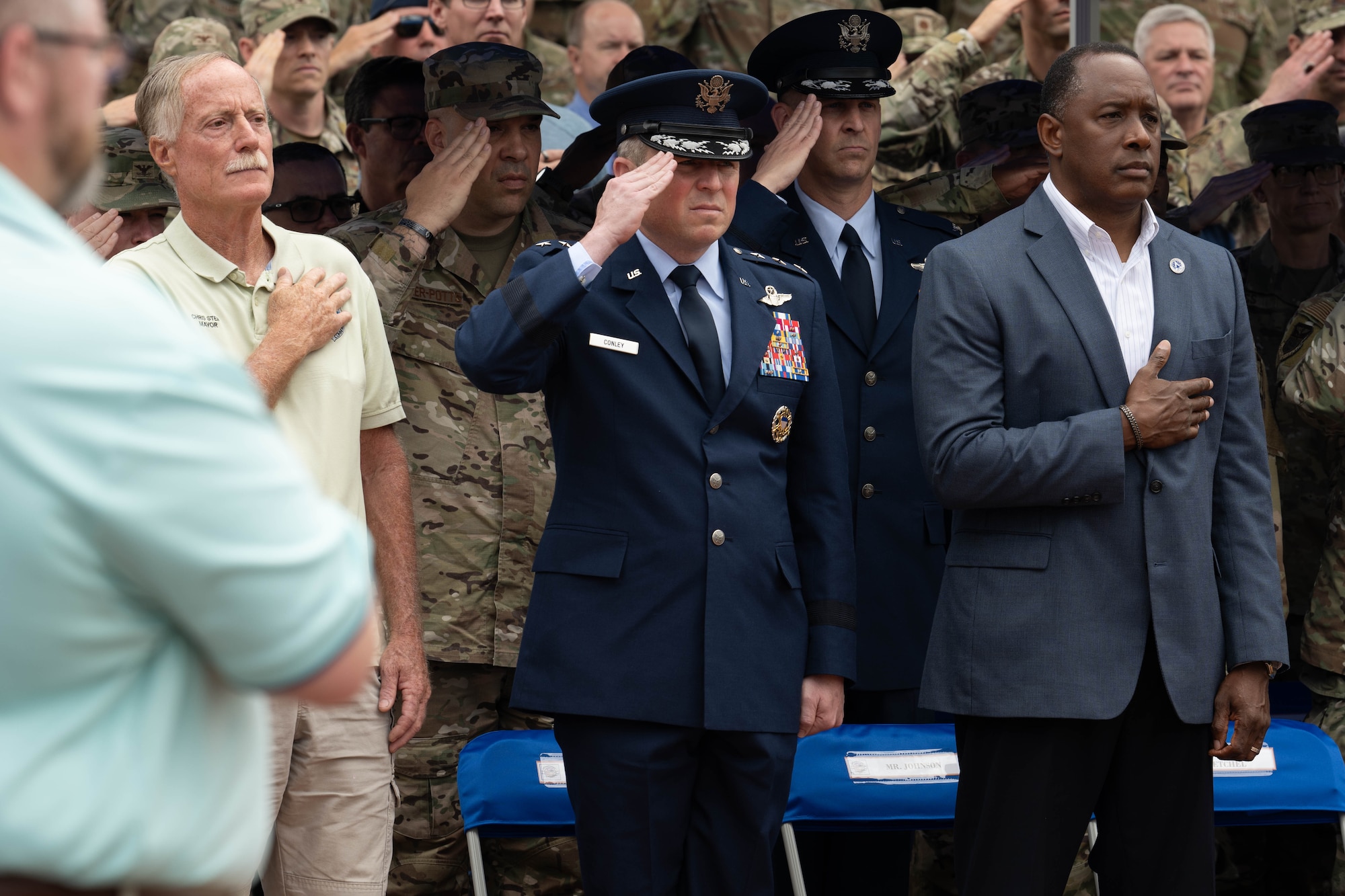 U.S. Air Force Lt. Gen. Michael Conley, commander of Air Force Special Operations Command salutes during the national anthem at a ceremony for the 45th anniversary of Operation Eagle Claw on Hurlburt Field, Florida., April 24, 2025.
