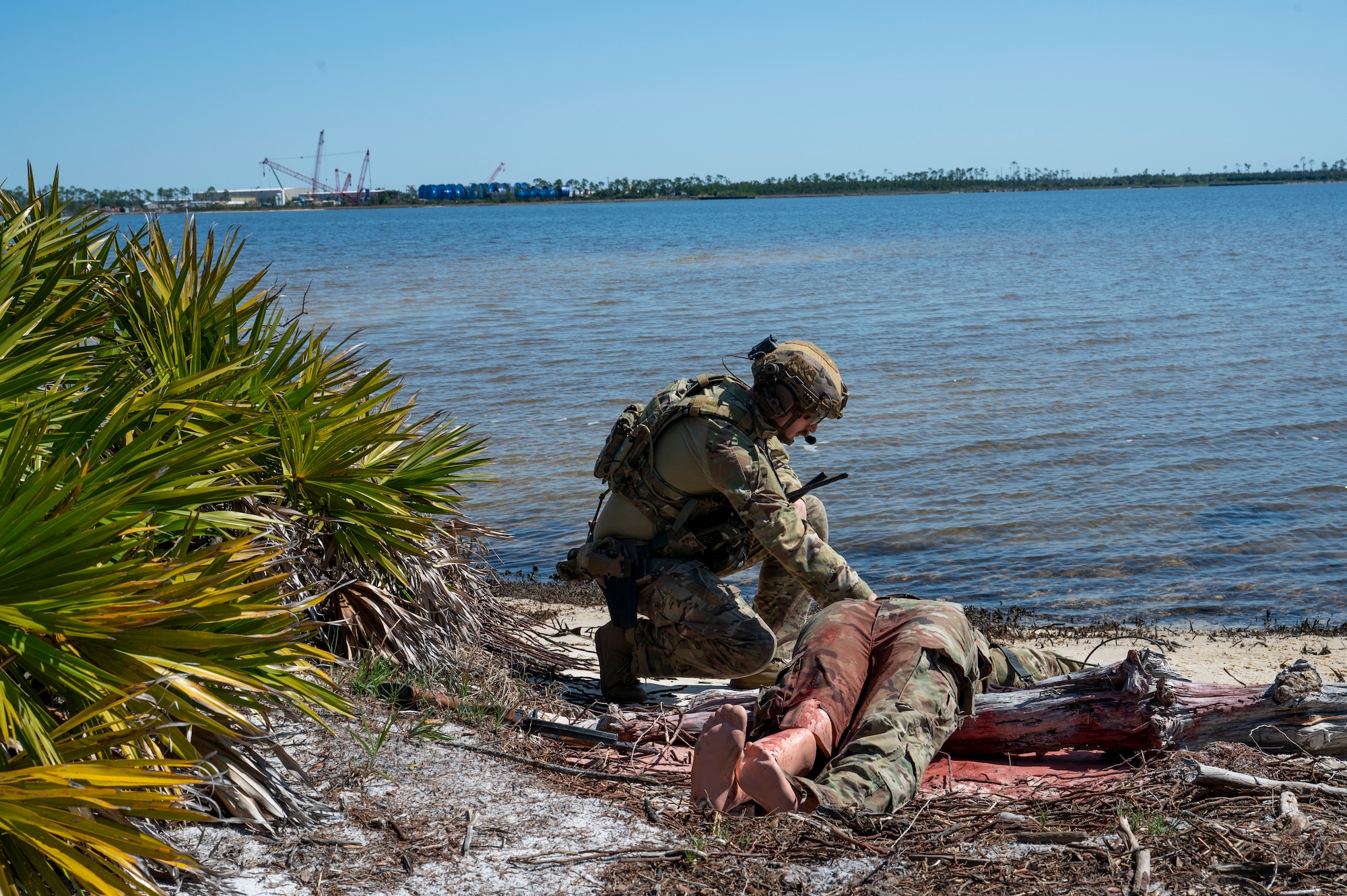 U.S. Air Force Tech. Sgt. Joel Miller, Explosive Ordnance Disposal team leader assigned to the 22nd Air Task Force, identifies an improvised explosive device during a Silver Flag exercise at Tyndall Air Force Base, Florida, April 9, 2025. EOD specialists are responsible for the safe handling and disposal of hazardous explosive materials. Exercises like this will continue to propel the 22nd ATF to operate effectively under stressful conditions in contested environments, resulting in a diverse force of Airmen prepared to undertake mission requirements. (U.S. photo by Airman 1st Class Samantha Thorn)