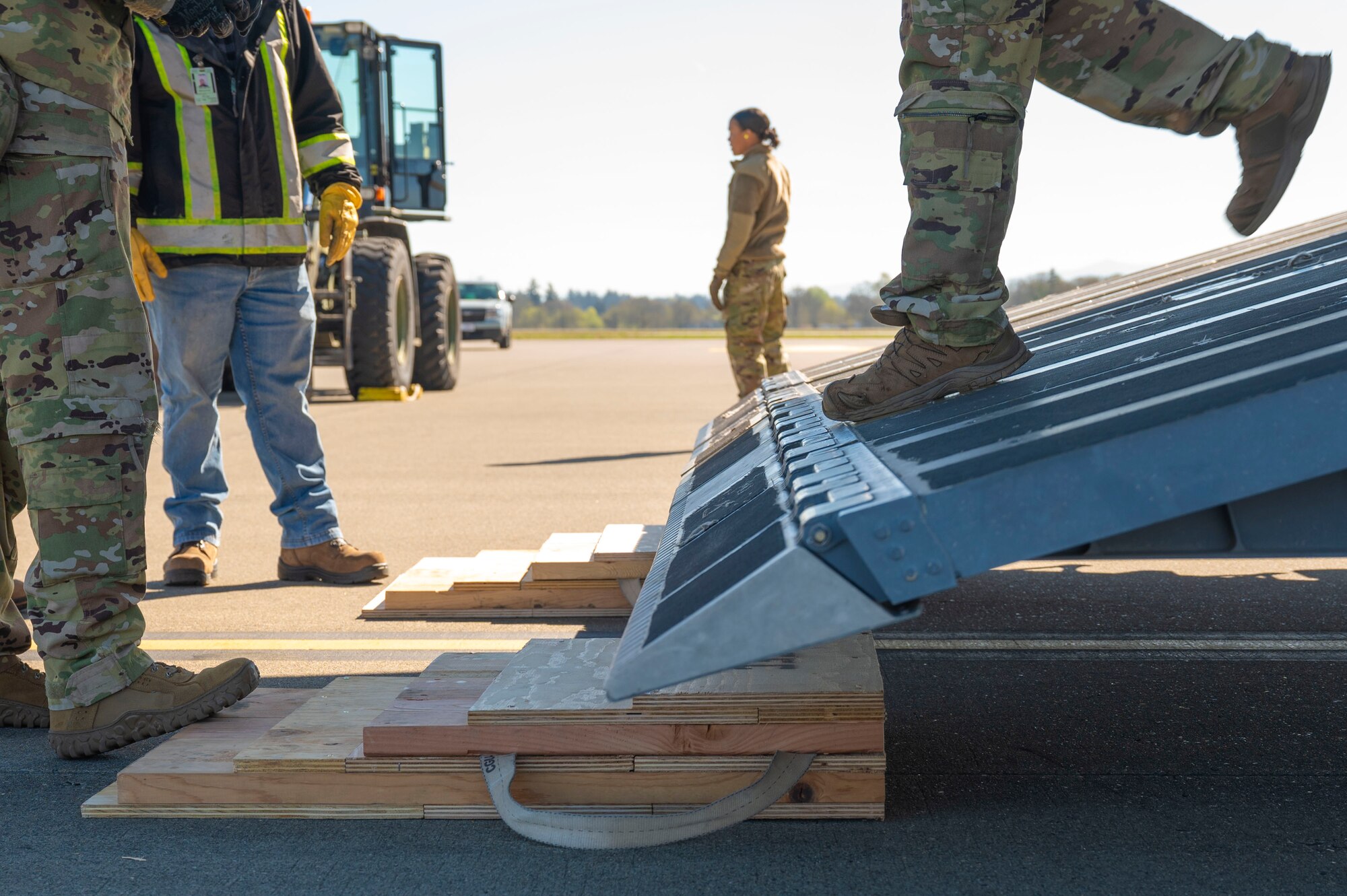 Team McChord Airmen and civilians across 62d Aerial Port Squadron, 62d Maintenance Group and the 4th Airlift Squadron loaded an Altec high-reach crane onto a C-17 Globemaster III at Joint Base Lewis-McChord, Washington, April 17, 2025. The crane was transported to Arizona to facilitate the replacement of the pitch trim actuator in the tail of another 62d Airlift Wing C-17. This crucial transport ensures Team McChord Airmen and aircraft are returned to a mission-capable status to support today’s global airlift mission.