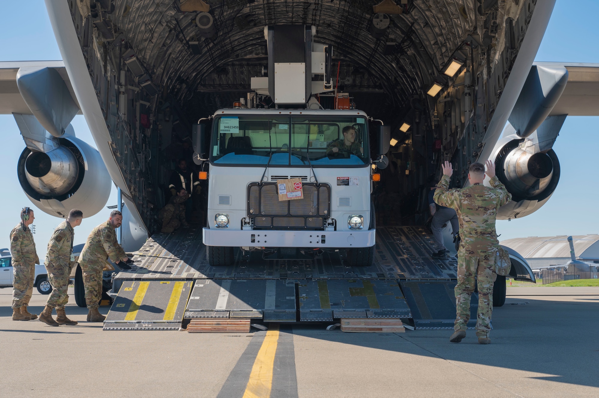 Team McChord Airmen and civilians across 62d Aerial Port Squadron, 62d Maintenance Group and the 4th Airlift Squadron loaded an Altec high-reach crane onto a C-17 Globemaster III at Joint Base Lewis-McChord, Washington, April 17, 2025. The crane was transported to Arizona to facilitate the replacement of the pitch trim actuator in the tail of another 62d Airlift Wing C-17. This crucial transport ensures Team McChord Airmen and aircraft are returned to a mission-capable status to support today’s global airlift mission.