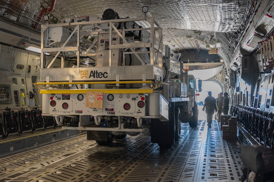 Team McChord Airmen and civilians across 62d Aerial Port Squadron, 62d Maintenance Group and the 4th Airlift Squadron loaded an Altec high-reach crane onto a C-17 Globemaster III at Joint Base Lewis-McChord, Washington, April 17, 2025. The crane was transported to Arizona to facilitate the replacement of the pitch trim actuator in the tail of another 62d Airlift Wing C-17. This crucial transport ensures Team McChord Airmen and aircraft are returned to a mission-capable status to support today’s global airlift mission.
