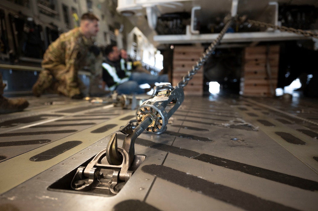 Team McChord Airmen and civilians across 62d Aerial Port Squadron, 62d Maintenance Group and the 4th Airlift Squadron loaded an Altec high-reach crane onto a C-17 Globemaster III at Joint Base Lewis-McChord, Washington, April 17, 2025. The crane was transported to Arizona to facilitate the replacement of the pitch trim actuator in the tail of another 62d Airlift Wing C-17. This crucial transport ensures Team McChord Airmen and aircraft are returned to a mission-capable status to support today’s global airlift mission.