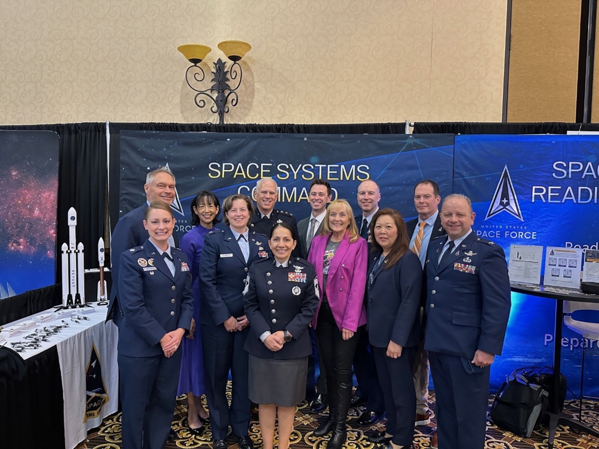 Members of Space Systems Command’s leadership team gather at the Field Command’s Space Symposium exhibit booth to talk with conference-goers from industry and other government agencies about the capabilities required by warfighters to ensure Joint Force lethality in an increasingly threatened space domain. (Photo: Bonnie Poindexter, Space Systems Command)