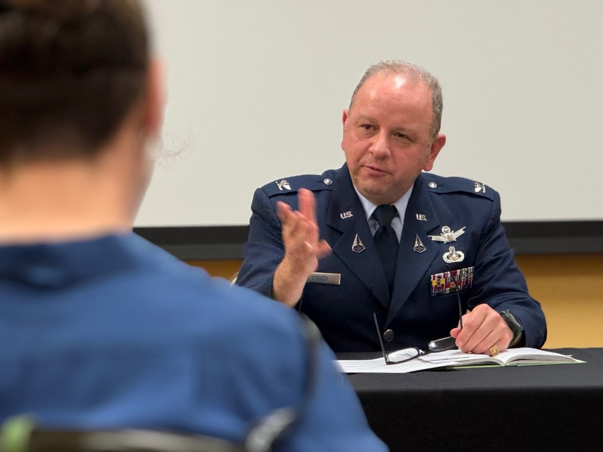 Col. Jon Strizzi, deputy director of Space Systems Command’s Space Systems Integration Office responds to a query during a media interview session on April 8 during Space Symposium in Colorado Springs, CO. Strizzi, along with other Space Systems Command leaders, participated in close to a dozen media interviews to share how resilient space capabilities are foundational to enabling the Joint Force to maneuver rapidly, respond in real-time, and stay ahead of adversaries. (Photo: Amy Picard, Space Systems Command)