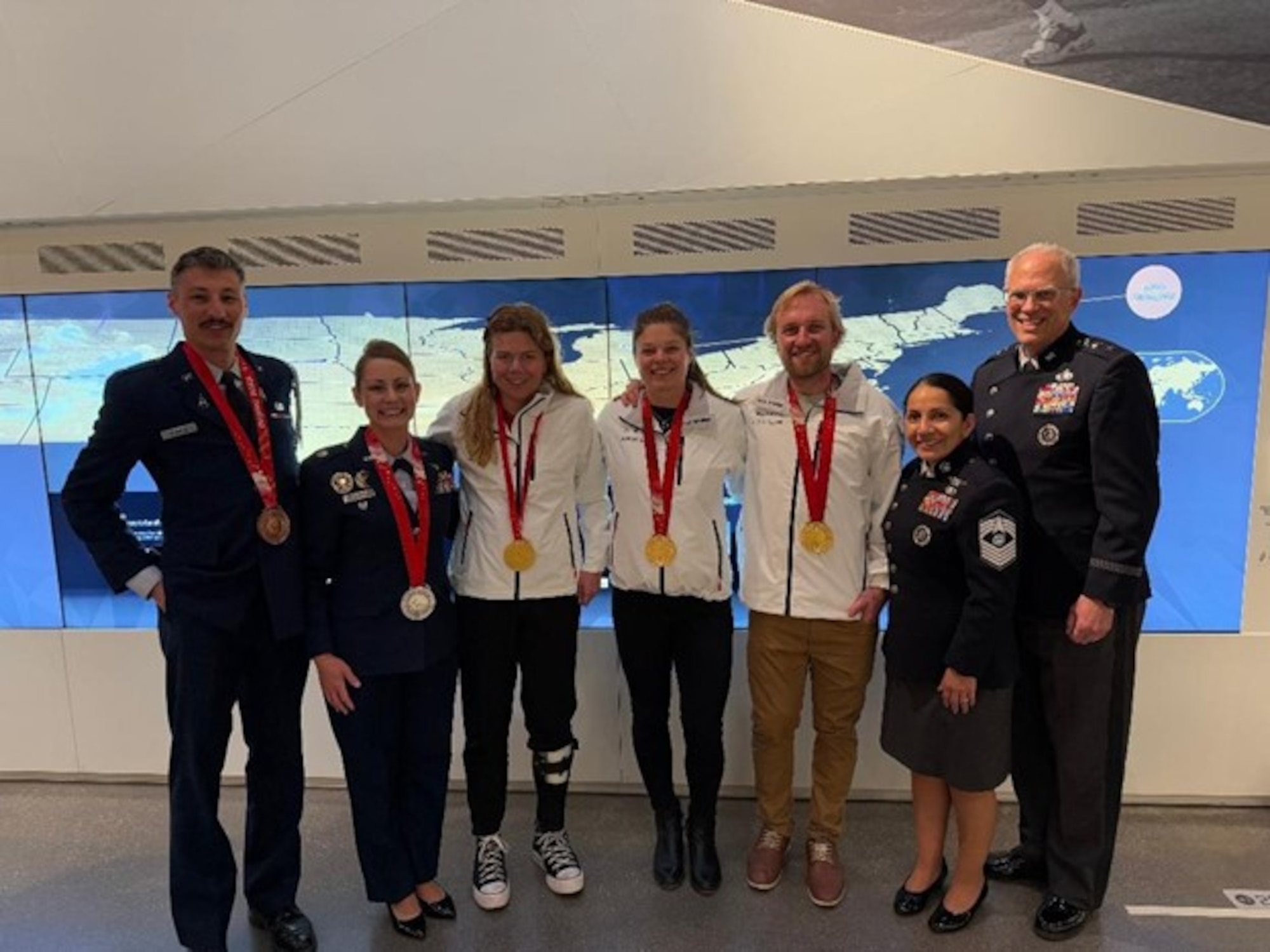 (From left) Capt. Christian Chavez, Lt. Col. Trisha Guillebeau, Chief Master Sergeant Jacqueline Sauvé, and Lt. Gen. Philip Garrant engage with Olympians and Paralympians at Space Unified, an event held in conjunction with the 40th annual Space Symposium, April 6 – 10, 2025 in Colorado Springs, Colo. Courtesy photo.