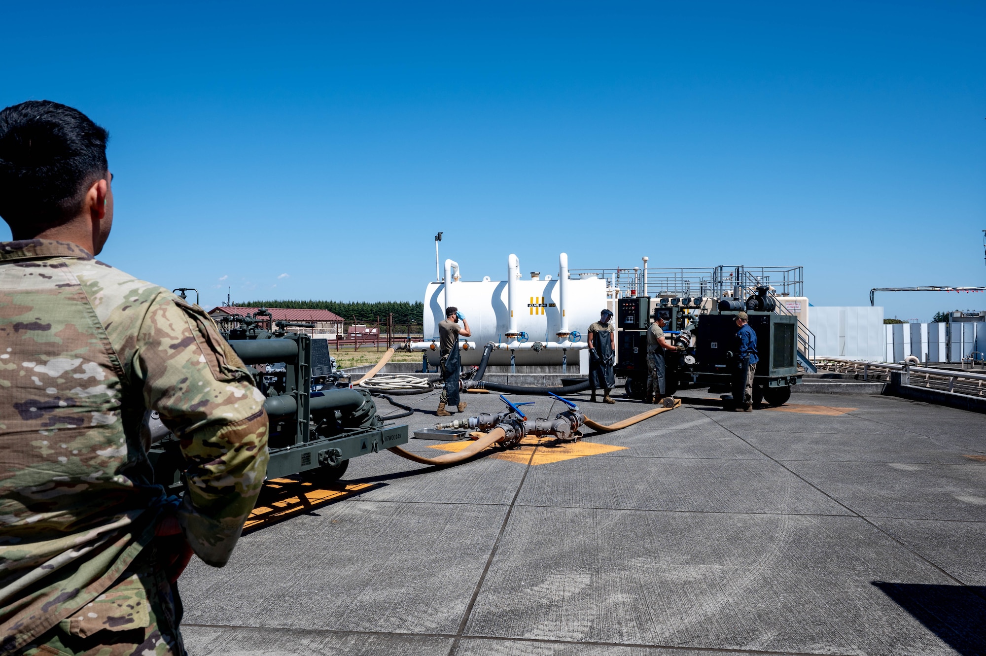 U.S. Air Force Airmen assigned to the 374th Logistics Readiness Squadron perform a periodic functional check.