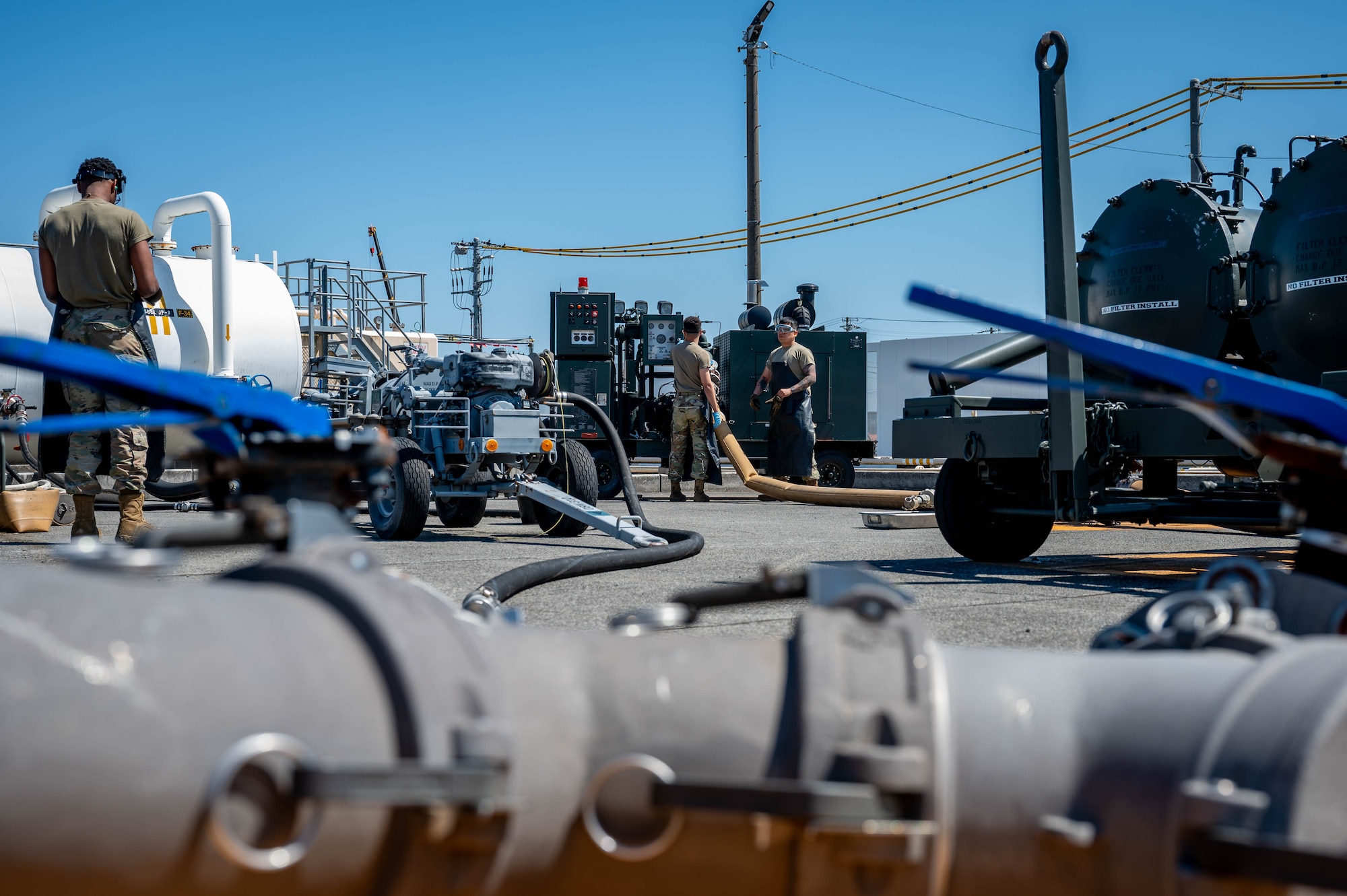 U.S. Air Force Airmen assigned to the 374th Logistics Readiness Squadron perform a periodic functional check.