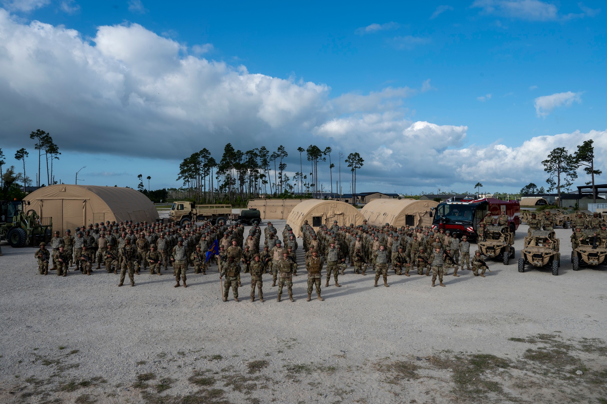 U.S. Air Force Airmen assigned to the 22nd Combat Air Base Squadron stand in formation at Tyndall Air Force Base, Florida, April 15, 2025. The 22nd CABS consists of approximately 350 members from various career fields across Travis, Fairchild and Beale AFBs, postured to support 2,500 deployed personnel. MAGPIE was a readiness exercise designed to evaluate and enhance the operational skills of the 22nd Air Task Force, ensuring that they are an agile and responsive asset within our Air Force. (U.S. Air Force photo by Airman 1st Class Samantha Thorn)