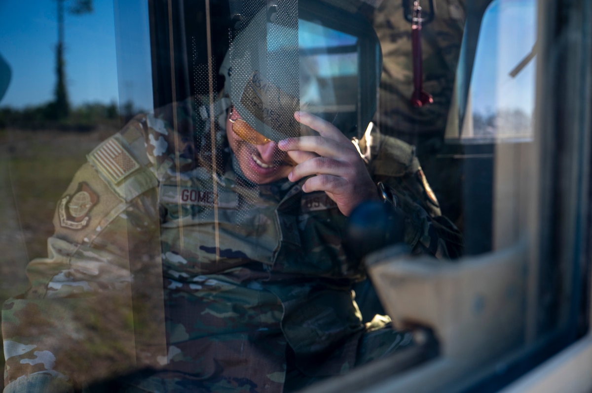 U.S. Air Force Staff Sgt. Ryan Gomez, a public affairs specialist assigned to the 92nd Air Refueling Wing, sits inside a Humvee during exercise MAGPIE at Tyndall Air Force Base, Florida, April 13, 2025. This exercise was designed to evaluate and enhance the operational skills of 22nd Air Task Force, ensuring that they are an agile and responsive asset within our Air Force. (U.S. photo by Airman 1st Class Samantha Thorn)