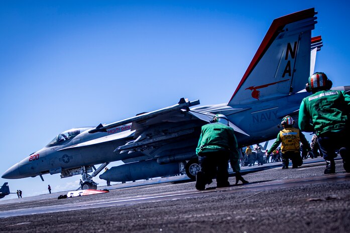 An F/A-18E Super Hornet from the “Mighty Shrikes” of Strike Fighter Squadron (VFA) 94 launches from the flight deck of the aircraft carrier USS Nimitz (CVN 68) in the Philippine Sea, April 23, 2025. Nimitz is underway in the U.S. 7th Fleet area of operations on a scheduled deployment, demonstrating the U.S. Navy's unwavering commitment to a free and open Indo-Pacific. (U.S. Navy photo by Mass Communication Specialist 2nd Class Hannah Kantner)