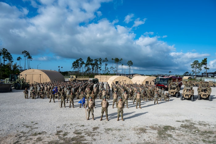 U.S. Air Force Airmen assigned to the 22nd Air Task Force stand in formation at Tyndall Air Force Base, Florida, April 15, 2025. MAGPIE was a readiness exercise designed to evaluate and enhance the operational skills of the 22nd ATF, ensuring that they are an agile and responsive asset within our Air Force. (U.S. Air Force photo by Airman 1st Class Samantha Thorn)