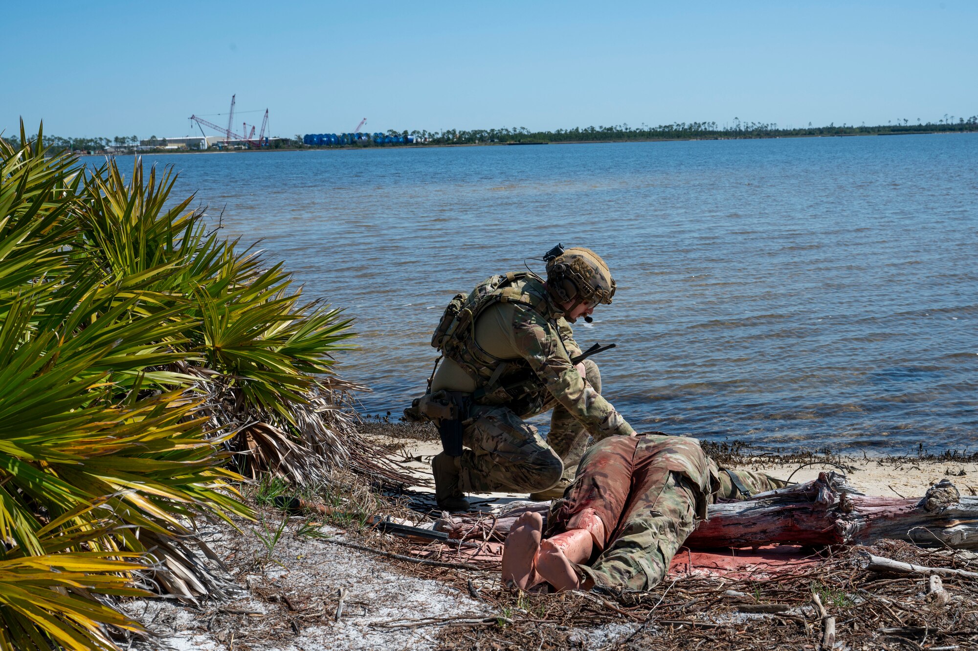 U.S. Air Force Tech. Sgt. Joel Miller, Explosive Ordnance Disposal team leader assigned to the 22nd Air Task Force, identifies an improvised explosive device during a Silver Flag exercise at Tyndall Air Force Base, Florida, April 9, 2025. EOD specialists are responsible for the safe handling and disposal of hazardous explosive materials. Exercises like this will continue to propel the 22nd ATF to operate effectively under stressful conditions in contested environments, resulting in a diverse force of Airmen prepared to undertake mission requirements. (U.S. photo by Airman 1st Class Samantha Thorn)