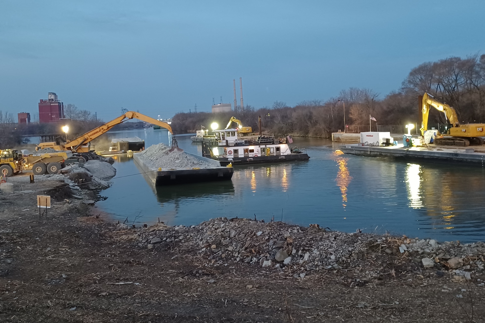 Contractors for the Brandon Road Interbasin Project work through the night to complete rock excavation in the channel of the Illinois Waterway.