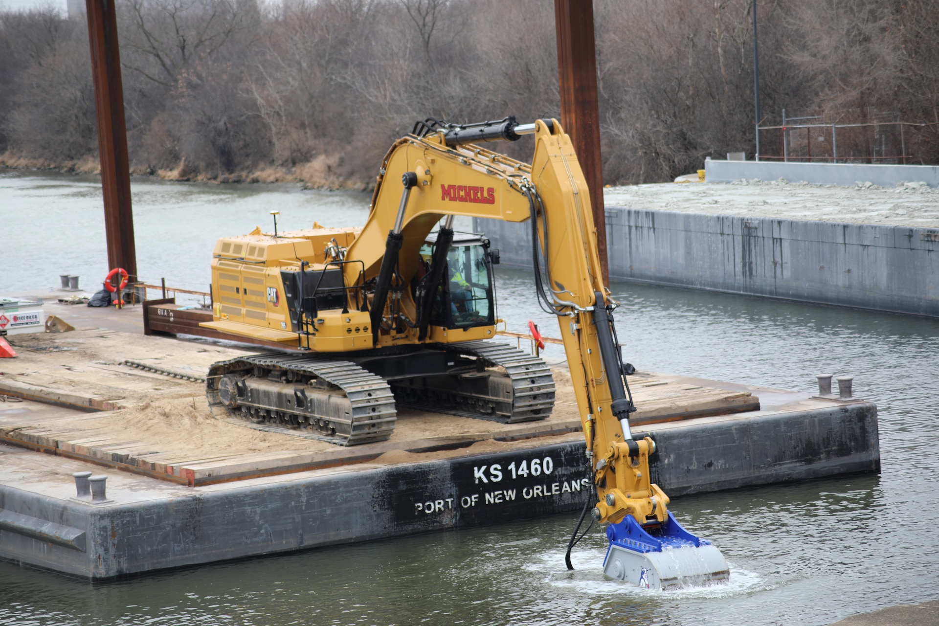 Contractors used an underwater jackhammer called an “Xcentric Ripper” to break up and remove bedrock from within the river channel below the Brandon Road Lock to make way for the engineered channel for the Brandon Road Interbasin Project.