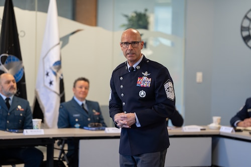 Chief Master Sgt. of the Space Force John F. Bentivegna speaks to a group or Airmen and Guardians.