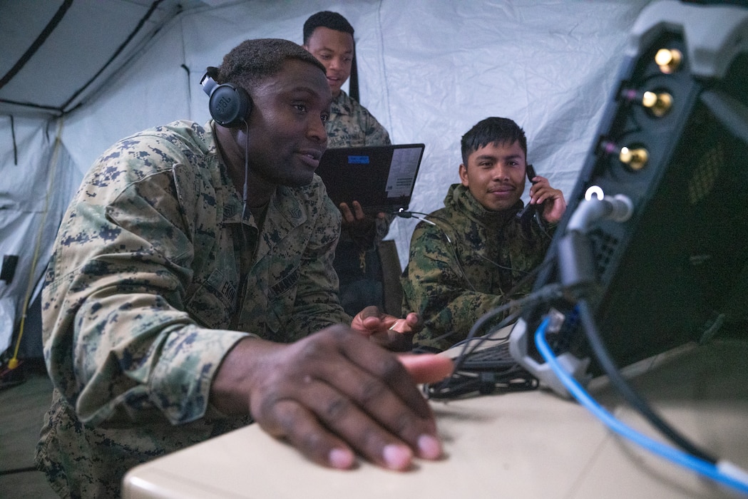 U.S. Marines with Marine Air Control Squadron (MACS) 24, 4th Marine Aircraft Wing, conduct various simulated mission scenarios during Northern Lightning 23 at Volk Field Air National Guard Base, Wisconsin, Aug. 14, 2023. Northern Lightning is one of the seven Air National Guard joint accredited readiness exercises that increases military readiness by providing participating units a tactical, joint training environment to execute realistic combat training. (U.S. Marine Corps photo by Cpl. Ujian Gosun)