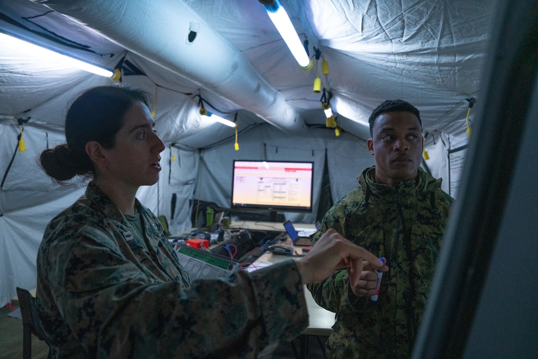 U.S. Marines with Marine Air Control Squadron (MACS) 24, 4th Marine Aircraft Wing, maintain communication and network capabilties during Northern Lightning 23 at Volk Field Air National Guard Base, Wisconsin, Aug. 14, 2023. Northern Lightning is one of the seven Air National Guard joint accredited readiness exercises that increases military readiness by providing participating units a tactical, joint training environment to execute realistic combat training. (U.S. Marine Corps photo by Cpl. Ujian Gosun)