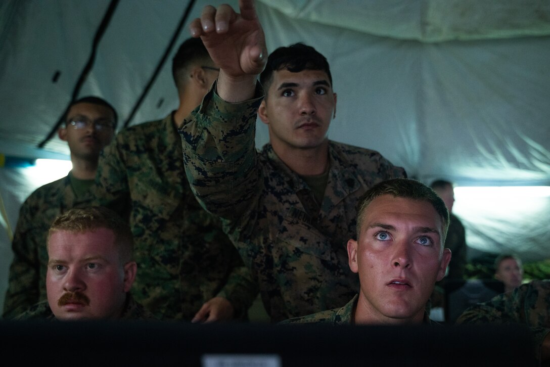 U.S. Marines with Marine Tactical Air Command Squadron (MTACS) 471, 4th Marine Aircraft Wing, conduct simulated mission scenarios during Northern Lightning 23 at Volk Field Air National Guard Base, Wisconsin, Aug. 13, 2023. Northern Lightning is one of the seven Air National Guard joint accredited readiness exercises that increases military readiness by providing participating units a tactical, joint training environment to execute realistic combat training. (U.S. Marine Corps photo by Cpl. Ujian Gosun)