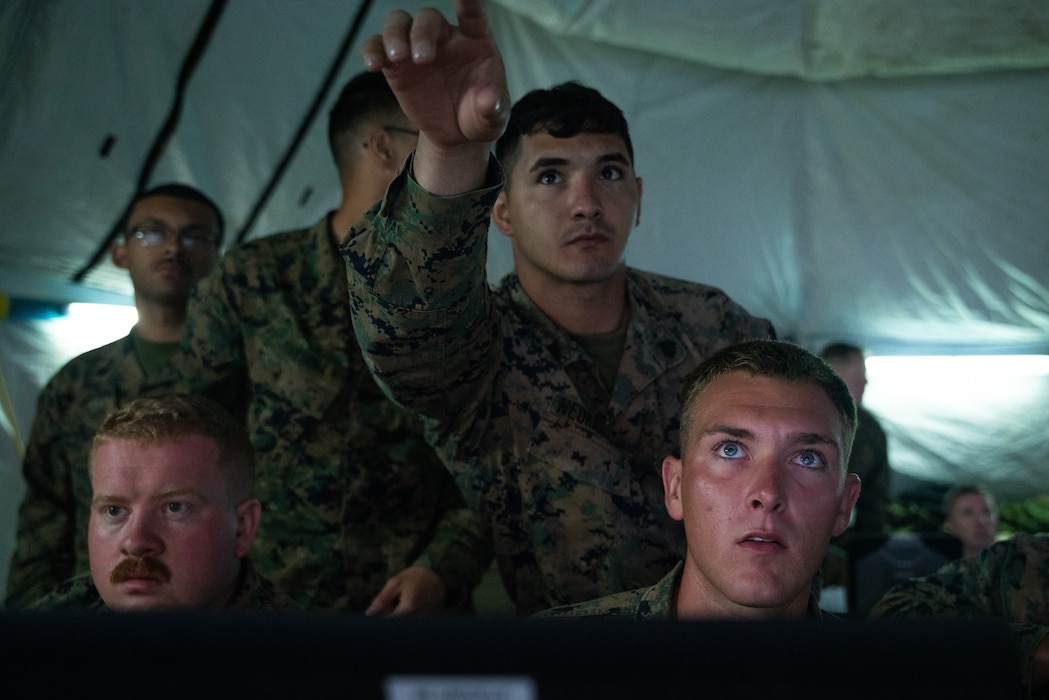 U.S. Marines with Marine Tactical Air Command Squadron (MTACS) 471, 4th Marine Aircraft Wing, conduct simulated mission scenarios during Northern Lightning 23 at Volk Field Air National Guard Base, Wisconsin, Aug. 13, 2023. Northern Lightning is one of the seven Air National Guard joint accredited readiness exercises that increases military readiness by providing participating units a tactical, joint training environment to execute realistic combat training. (U.S. Marine Corps photo by Cpl. Ujian Gosun)