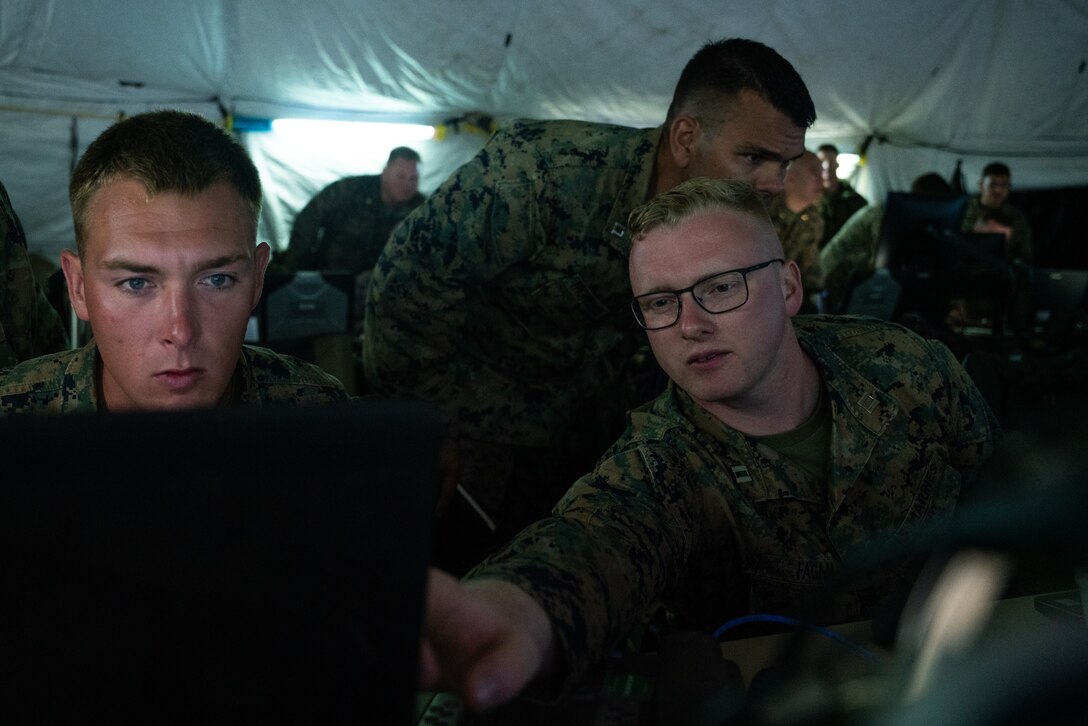 U.S. Marines with Marine Tactical Air Command Squadron (MTACS) 471, 4th Marine Aircraft Wing, conduct simulated mission scenarios during Northern Lightning 23 at Volk Field Air National Guard Base, Wisconsin, Aug. 13, 2023. Northern Lightning is one of the seven Air National Guard joint accredited readiness exercises that increases military readiness by providing participating units a tactical, joint training environment to execute realistic combat training. (U.S. Marine Corps photo by Cpl. Ujian Gosun)