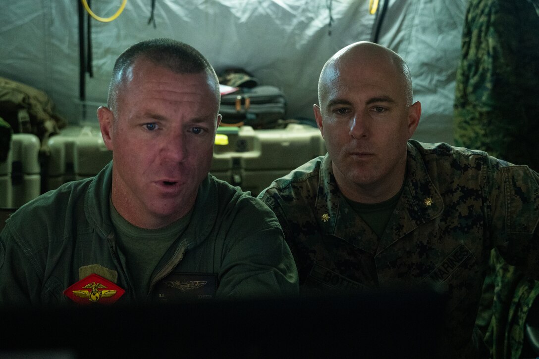 U.S. Marines with Marine Tactical Air Command Squadron (MTACS) 471, 4th Marine Aircraft Wing, conduct simulated mission scenarios during Northern Lightning 23 at Volk Field Air National Guard Base, Wisconsin, Aug. 13, 2023. Northern Lightning is one of the seven Air National Guard joint accredited readiness exercises that increases military readiness by providing participating units a tactical, joint training environment to execute realistic combat training. (U.S. Marine Corps photo by Cpl. Ujian Gosun)