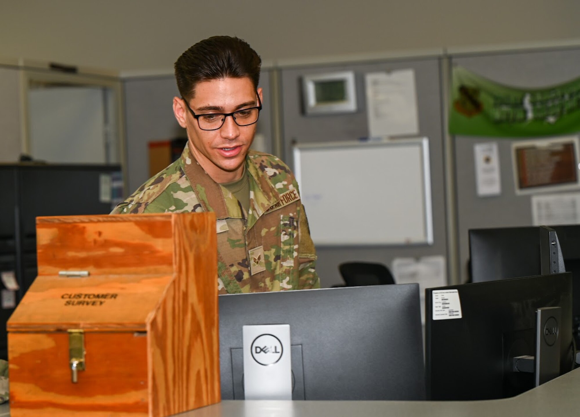 U.S. Air Force Senior Airman Joseph Rivera, 42nd Logistics Readiness Squadron passenger travel technician, looks at his computer at Maxwell Air Force Base, Alabama, April 24, 2025.