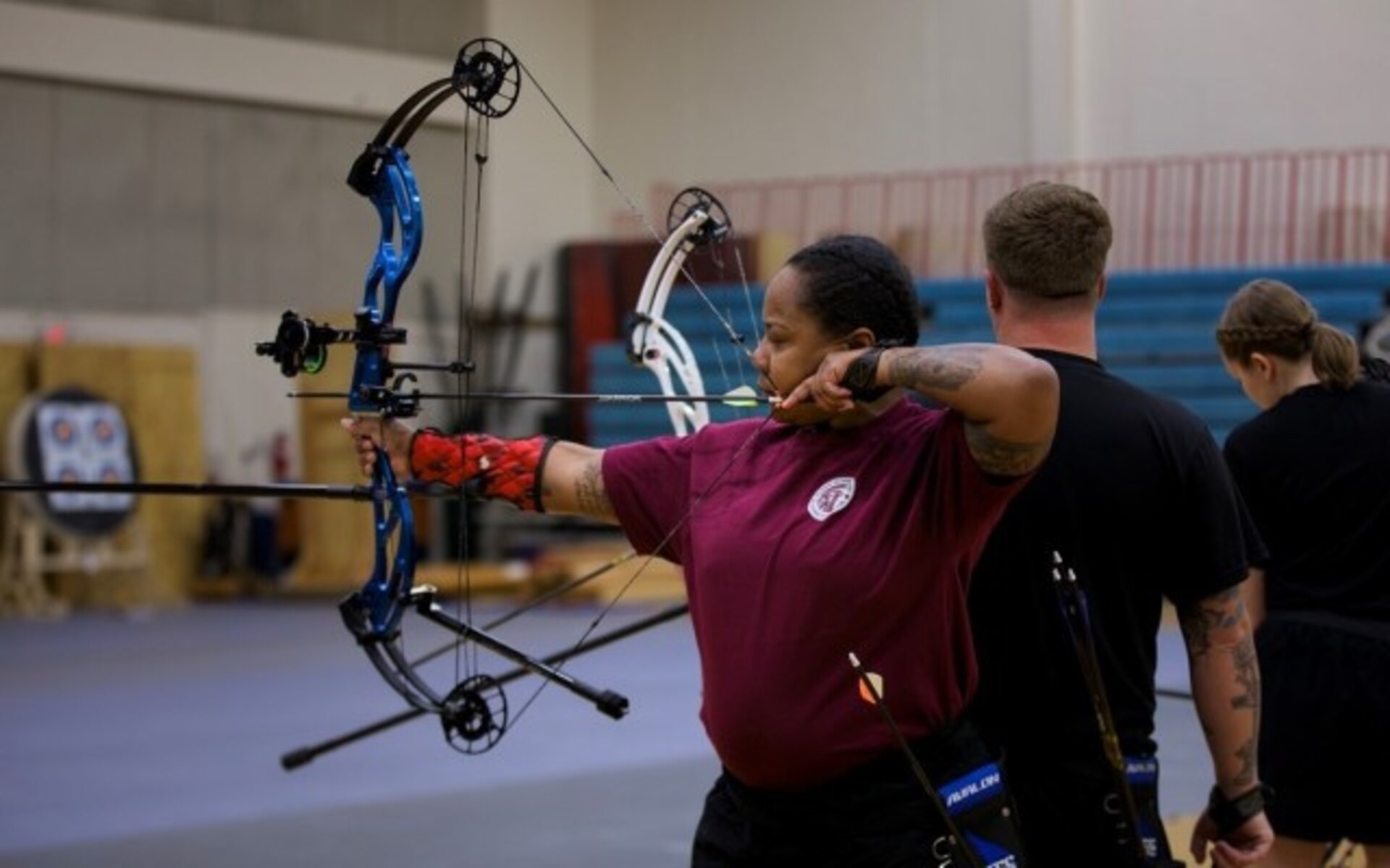 U.S. Army Sgt. 1st Class Valerie Watkins prepares to shoot her compound bow during the archery competition at the 2025 Army Trials, Fort Bliss, Texas, April 7, 2025.