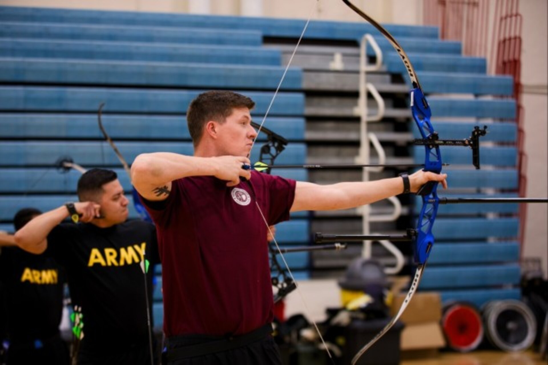 U.S. Army Sgt. Jeffery Chavez, left, and Staff Sgt. Coty Tuck, right, draw their bows during archery training at the 2025 Army Trials, Fort Bliss, Texas, April 6, 2025.