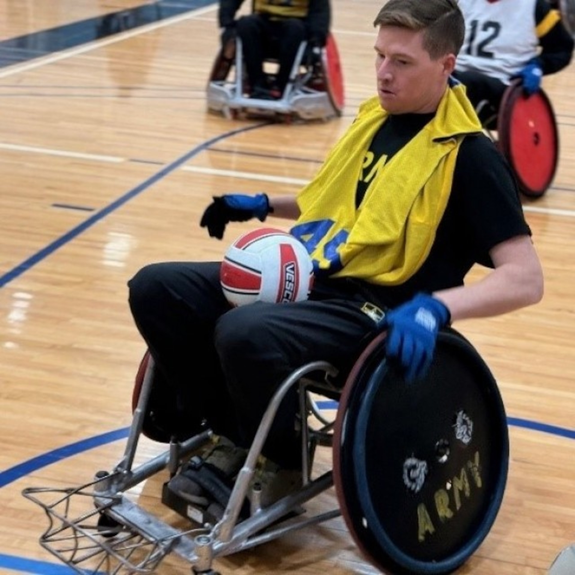 Staff Sgt. Coty Tuck during wheelchair rugby drills at the 2025 Army Trials on Fort Bliss, Texas, April 3, 2025.