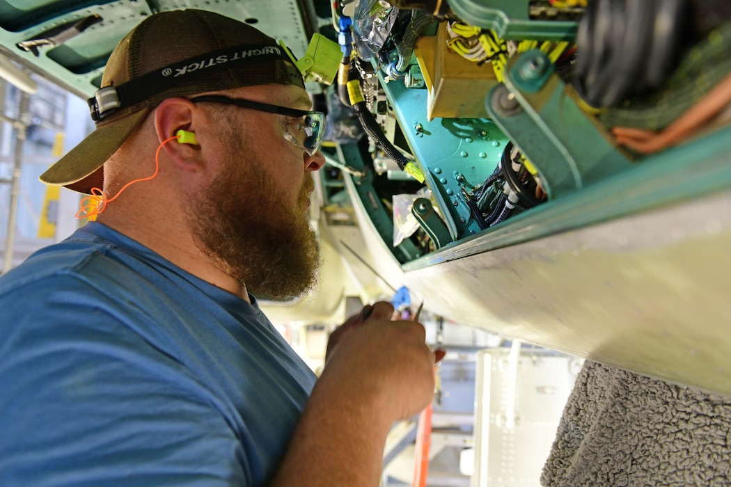 man working on aircraft