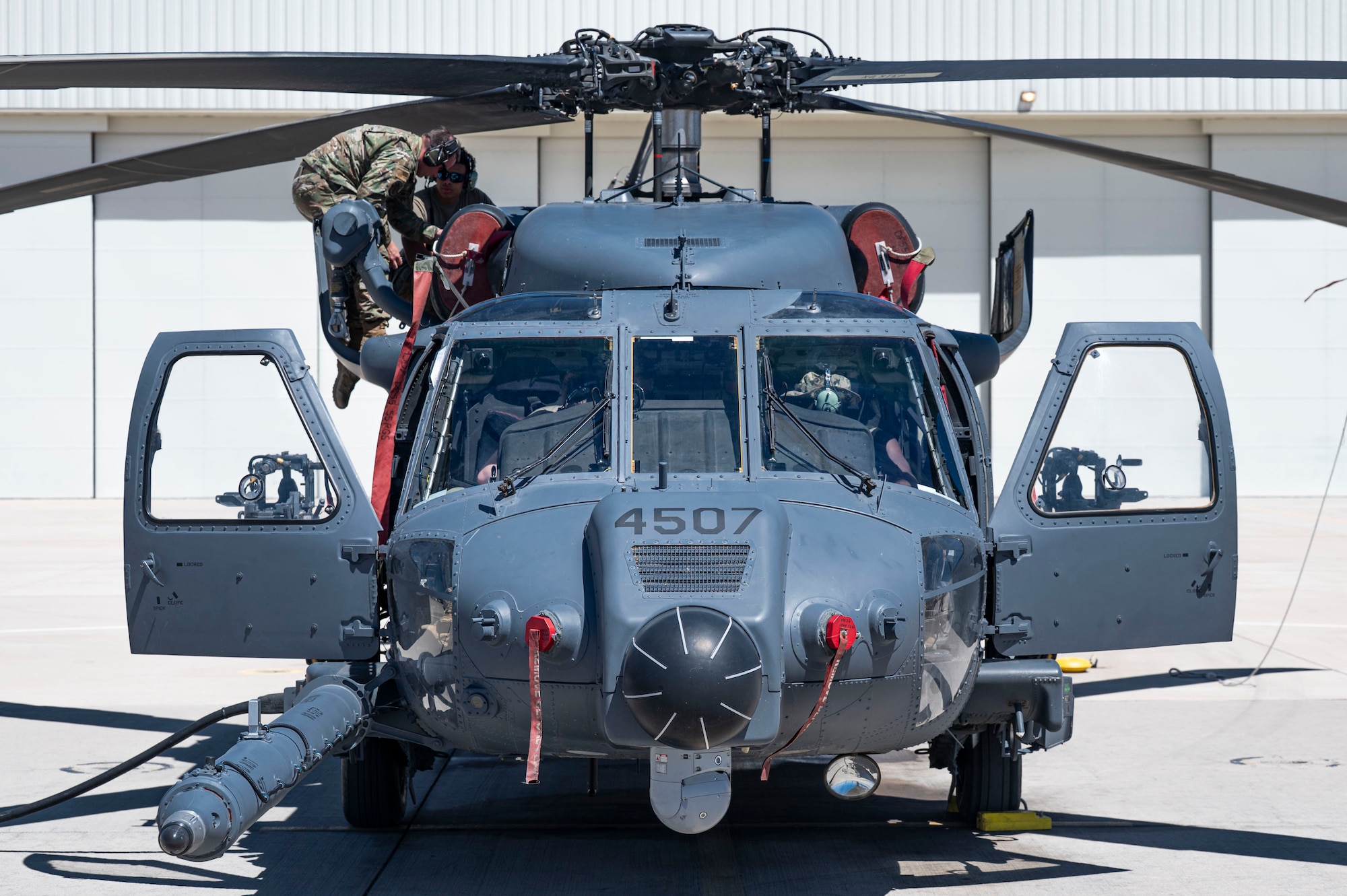 U.S. Air Force Airmen assigned to the 55th Rescue Generation Squadron perform detailed inspections on an HH-60W Jolly Green II helicopter during scheduled maintenance to ensure operational readiness at Davis-Monthan Air Force Base, Arizona, April 23, 2025. Maintainers play a critical role in ensuring the fleet’s readiness, working tirelessly to keep aircraft in top condition for missions that require precision, speed and reliability. (U.S. Air Force photo by Airman Samantha Melecio)