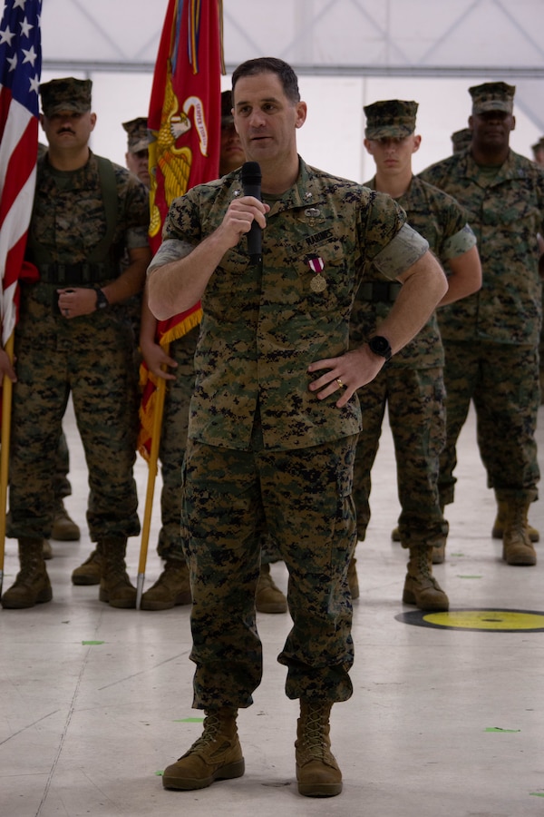 U.S. Marine Corps Lt. Col. Jeffery G. Dean, outgoing commanding officer, Marine Aviation Logistics Squadron 49 (MALS-49), Marine Aircraft Group 49, 4th Marine Air Wing, gives his remarks during the MALS-49 change of command ceremony on Marine Corps Air Station New River, in Jacksonville, North Carolina, April 12, 2025. The change of command ceremony represents the transfer of responsibility, authority, and accountability from the outgoing commanding officer to the incoming commanding officer. (U.S. Marine Corps photo by Lance Cpl. Hunter Brock)