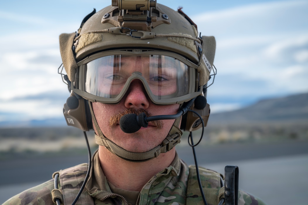 Airman poses for photograph