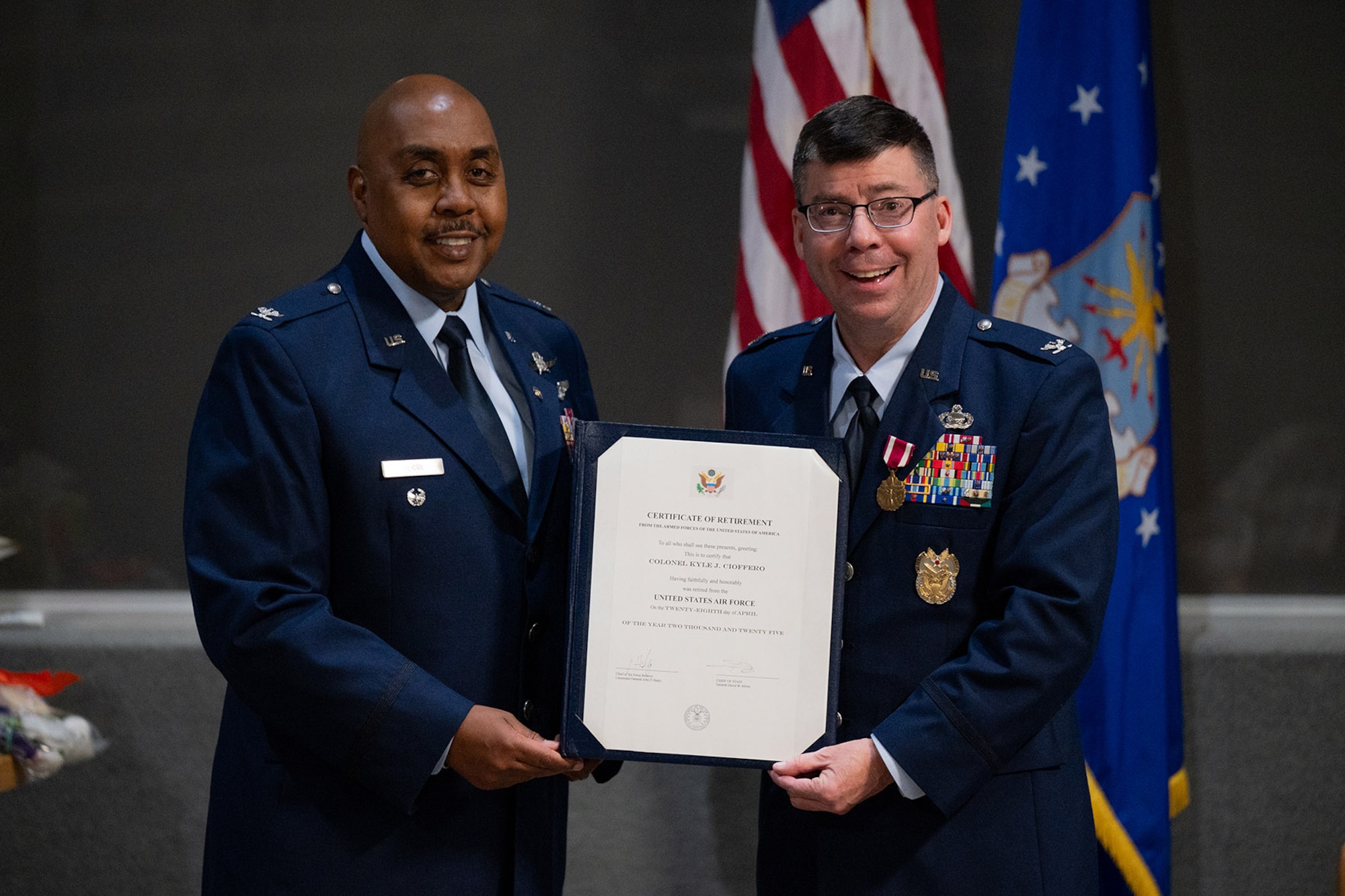 Col. Terry presents Col. Cioffero with the Certificate of Retirement